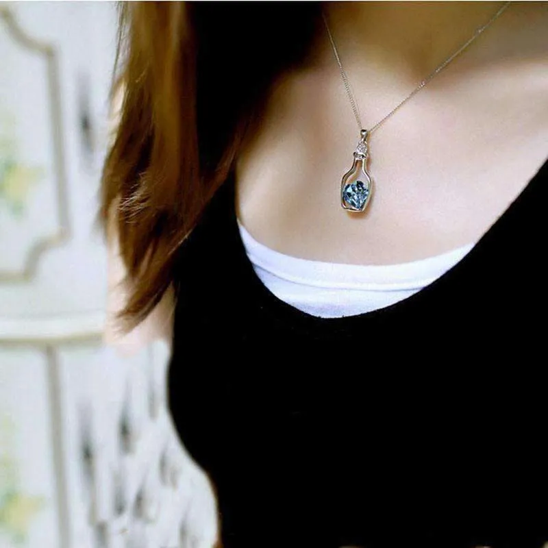 Bottled Up Love IOBI Crystals Necklace In Aqua Blue For Woman
