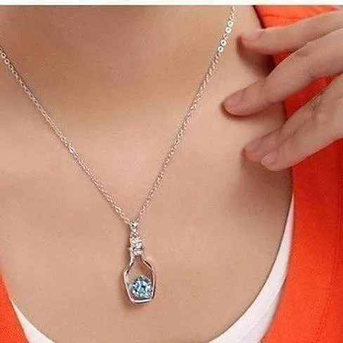 Bottled Up Love IOBI Crystals Necklace In Aqua Blue For Woman