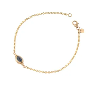 Captured Bracelet with Cabochon Cut Blue Sapphire