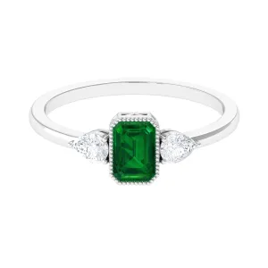 Created Emerald and Diamond Three Stone Ring in Bezel Setting