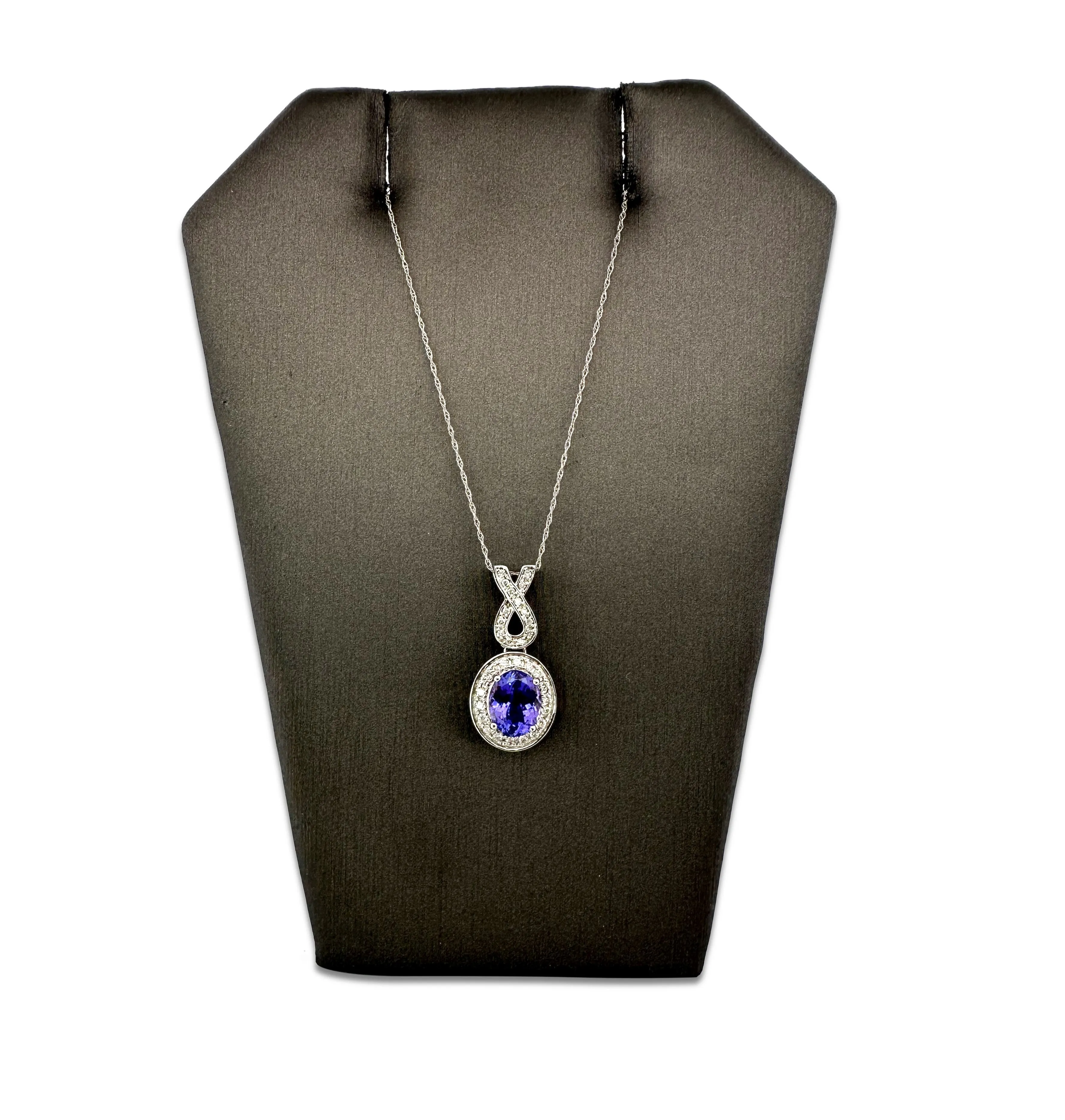 Oval Tanzanite and Round Brilliant Diamond Halo Pendant Necklace in 14k White Gold